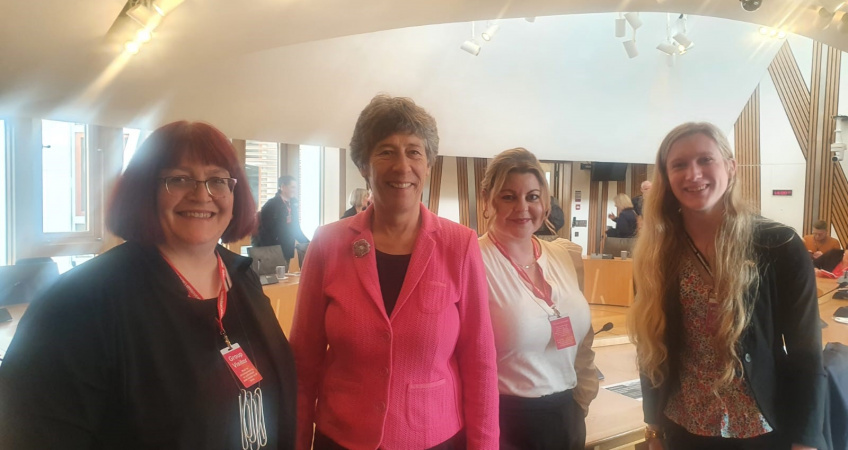 Group of women standing.